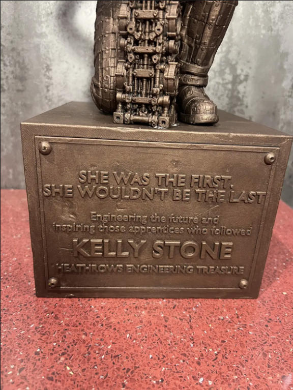 Close-up of the finished Kelly Stone retirement statue plaque